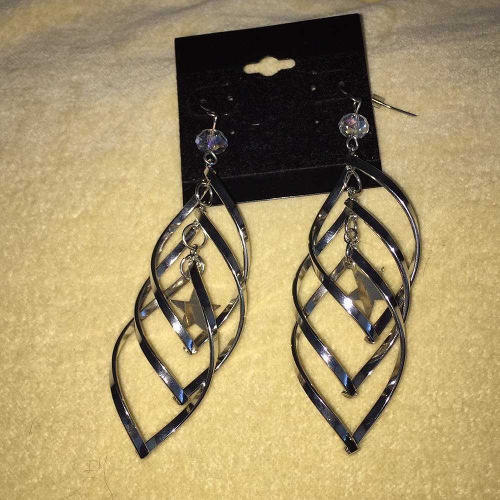 Silver earrings dangling